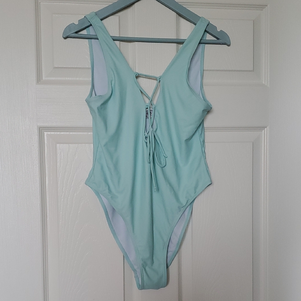 Blue One Piece Swimsuit with Plunging V-Neck and Lace-Up Detail